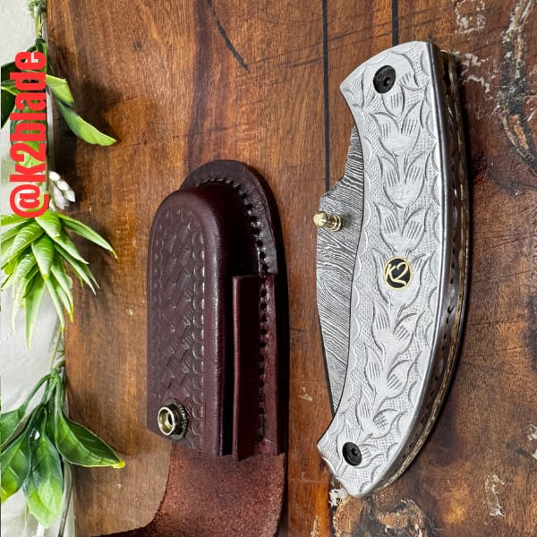 Engraved steel folder