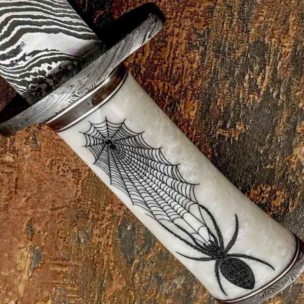 Spiderweb handle design